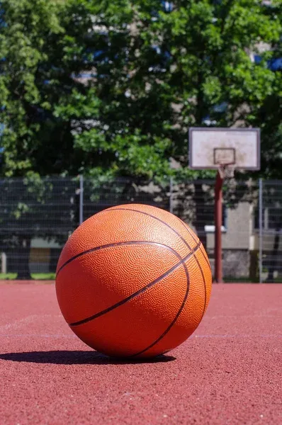 depositphotos_218235520-stock-photo-outdoors-basketball-court-basketball-ball